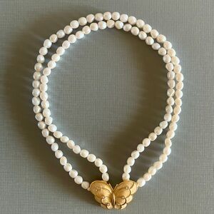 Vintage Avon Papillon Collection butterfly faux pearl double-strand necklace.